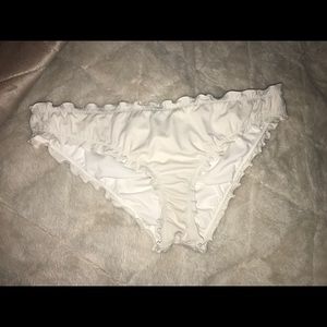 white ruffled swimsuit bottoms